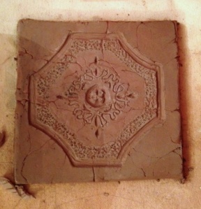 A tile made in a mold of my parents old bathroom linoleum